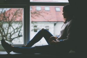 silhouette of a girl in a window