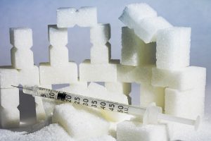 sugar cubes and a syringe