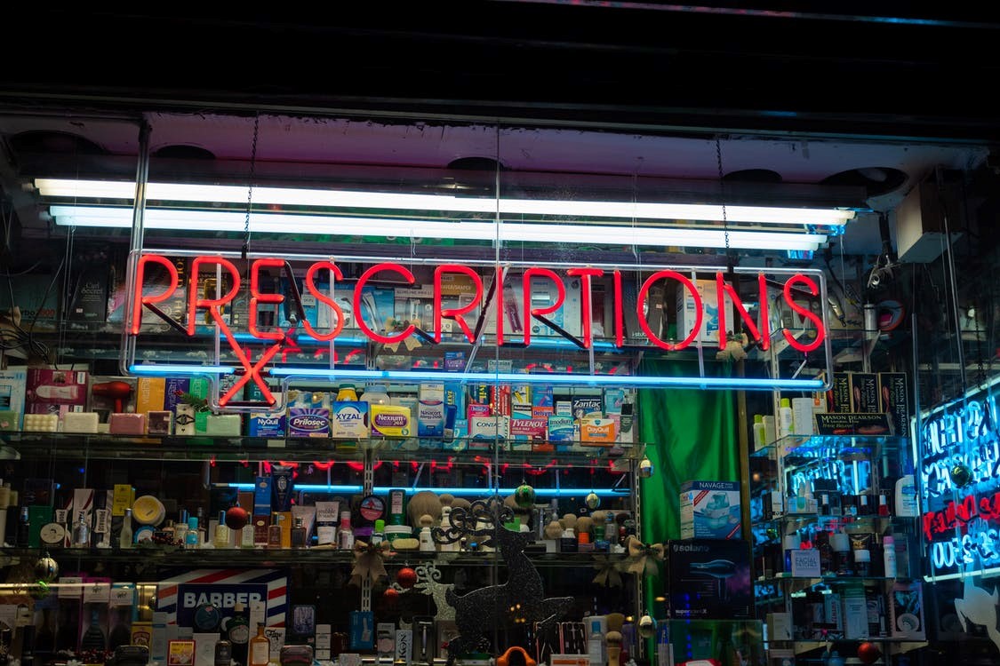 A prescriptions sign at a local pharmacy.