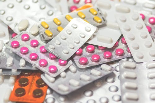 Various colored blister packs of medications that patients use.