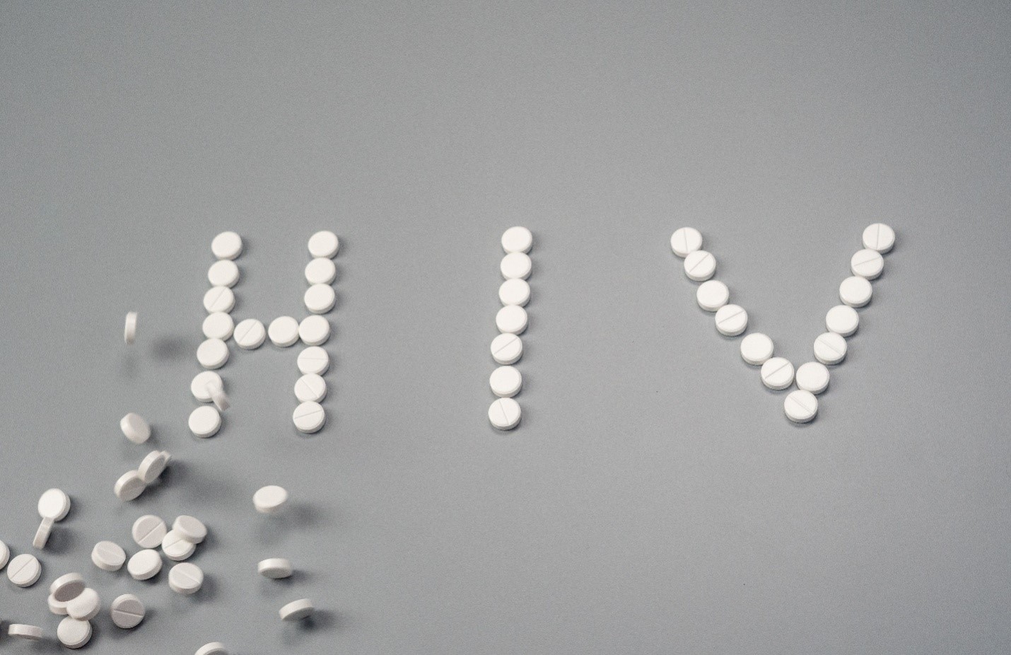 HIV written with pills