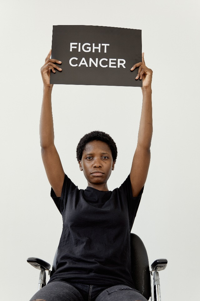 a woman holding a poster