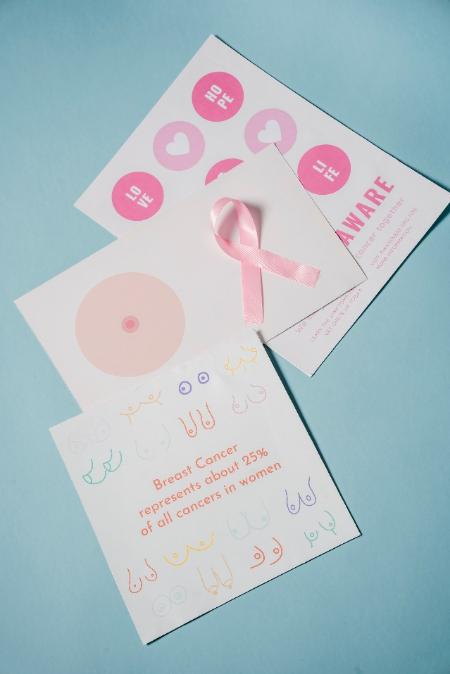a pink ribbon on top OI cards