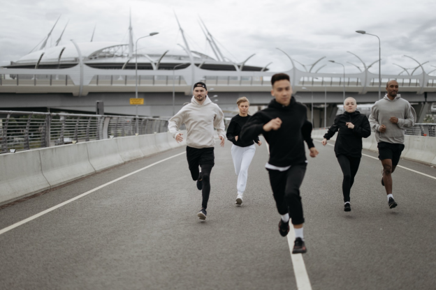 People jogging on the road.