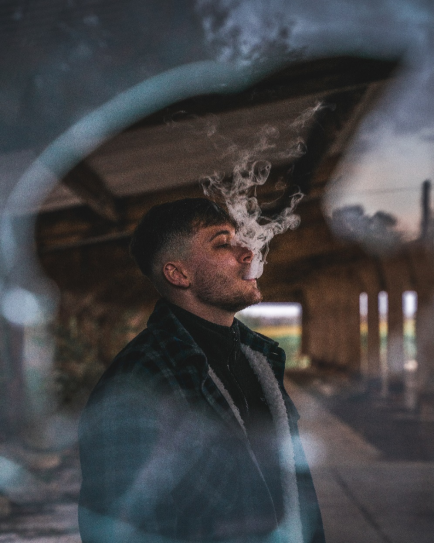 A person smoking.