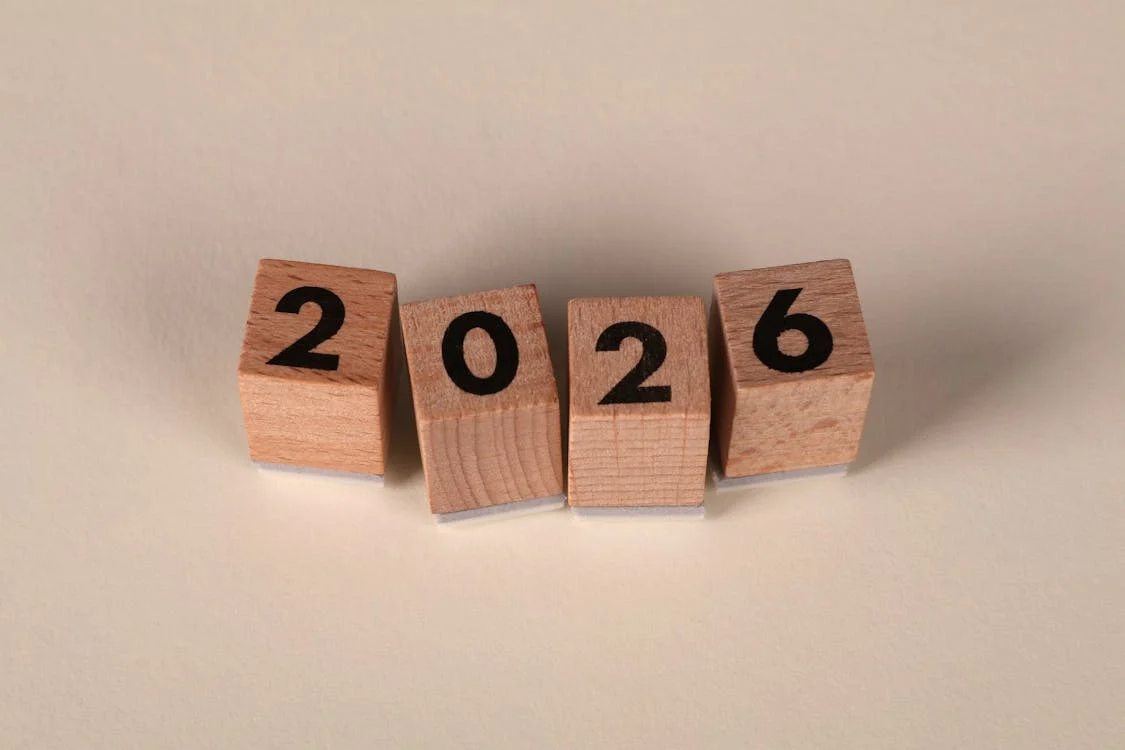 Wooden blocks spelling out “2026.”